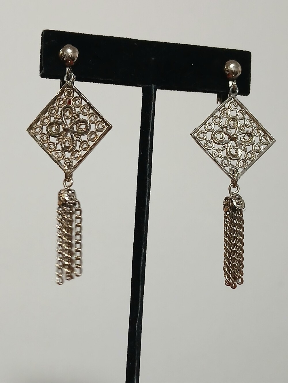 Vintage silver tone filigree clip on dangle earrings tassel